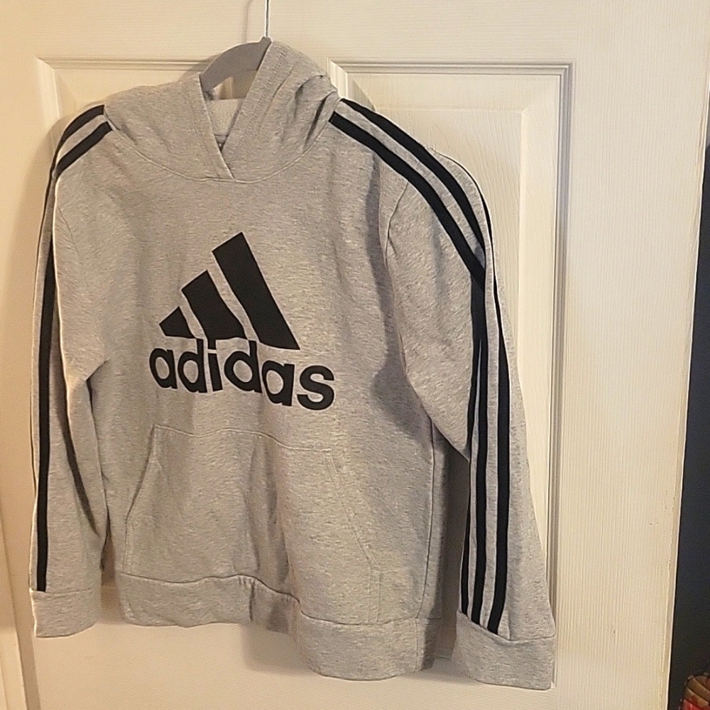 Boys Adidas Hoodie Size 10-12, small hole in the back. Picture shown.